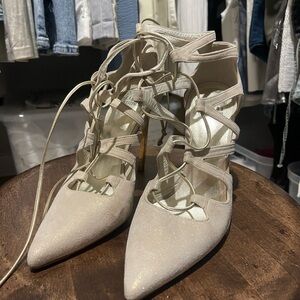 Stuart Weitzman Shimmering Cream Lace-Up Heels
